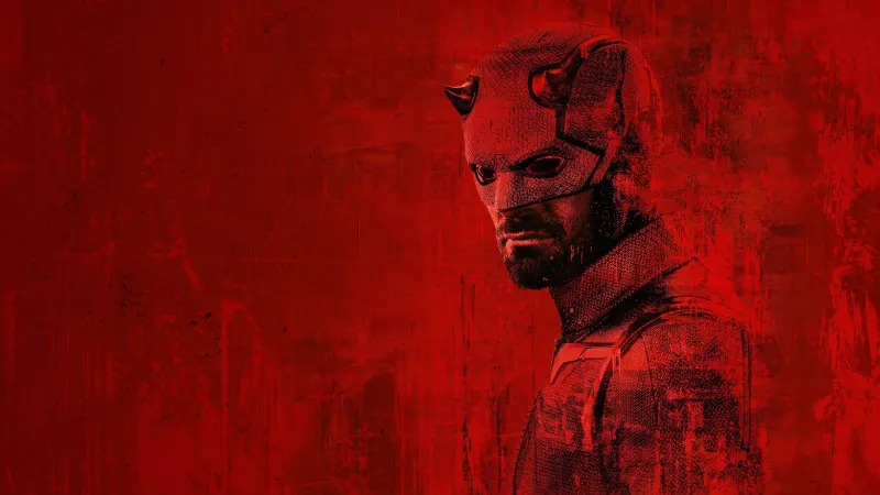 Daredevil w czerwonym kostiumie z rogami, ujęcie z twarzą w półmroku, grafika promocyjna serialu Daredevil: Odrodzenie